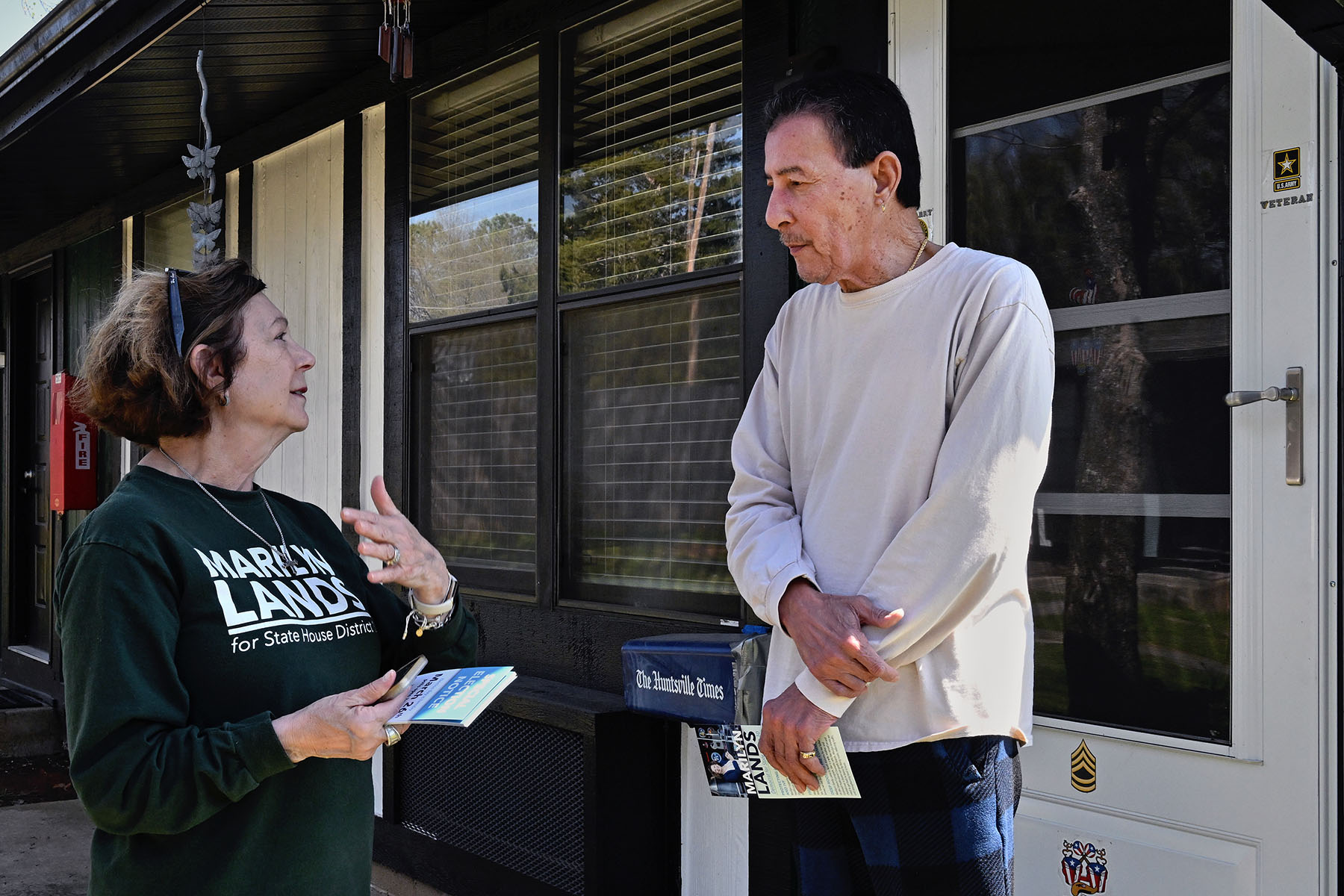 Marilyn Lands chats with a constituent in the suburbs of Huntsville, Alabama