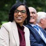 Angela Alsobrooks smiles as she sits during a press conference in Capitol Heights, Maryland.