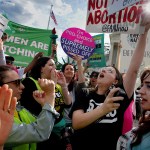 Abortion rights supporters rally outside the Supreme Court.