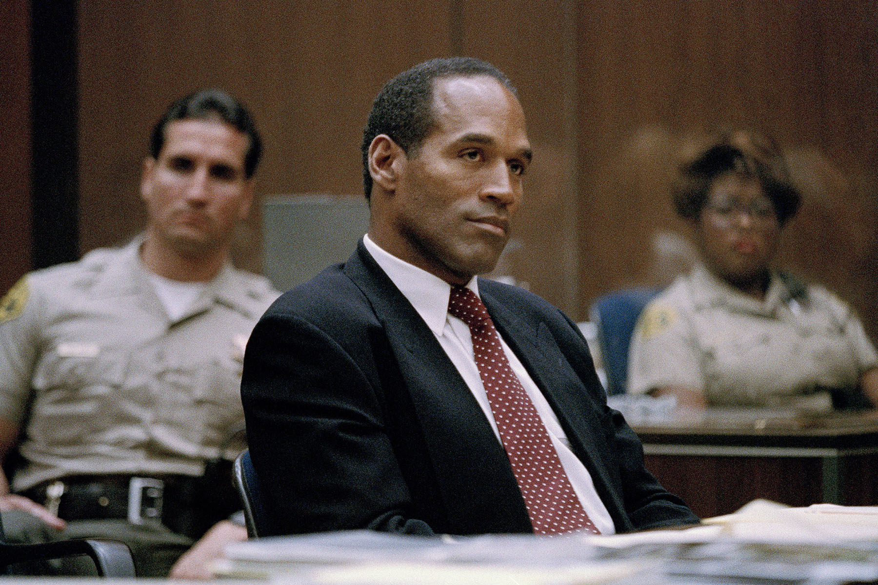 O.J. Simpson smiles slightly as he appears in Los Angeles County Superior Court for his preliminary hearing.