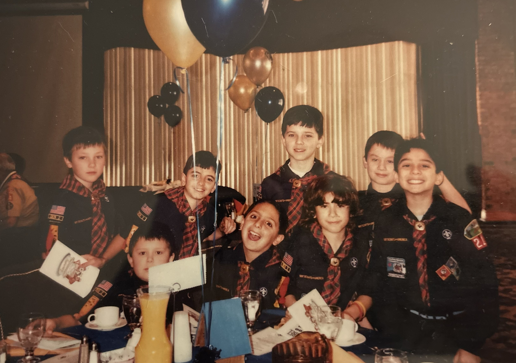 A group of Cub Scouts pose for a photo.