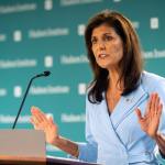 Nikki Haley stands in front of a microphone