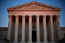 The U.S. Supreme Court is seen at dawn.