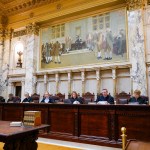 Justice consult documents inside the Wisconsin Supreme Court.