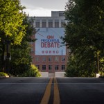 Banners are placed outside of CNN studios ahead of the first presidential debate in Atlanta, Georgia on June 24, 2024. The Banner reads 