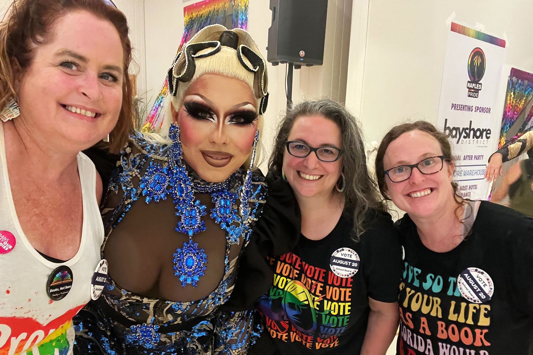 Interfaith Alliance of Southwest Florida members pose with drag star India Ferrah.