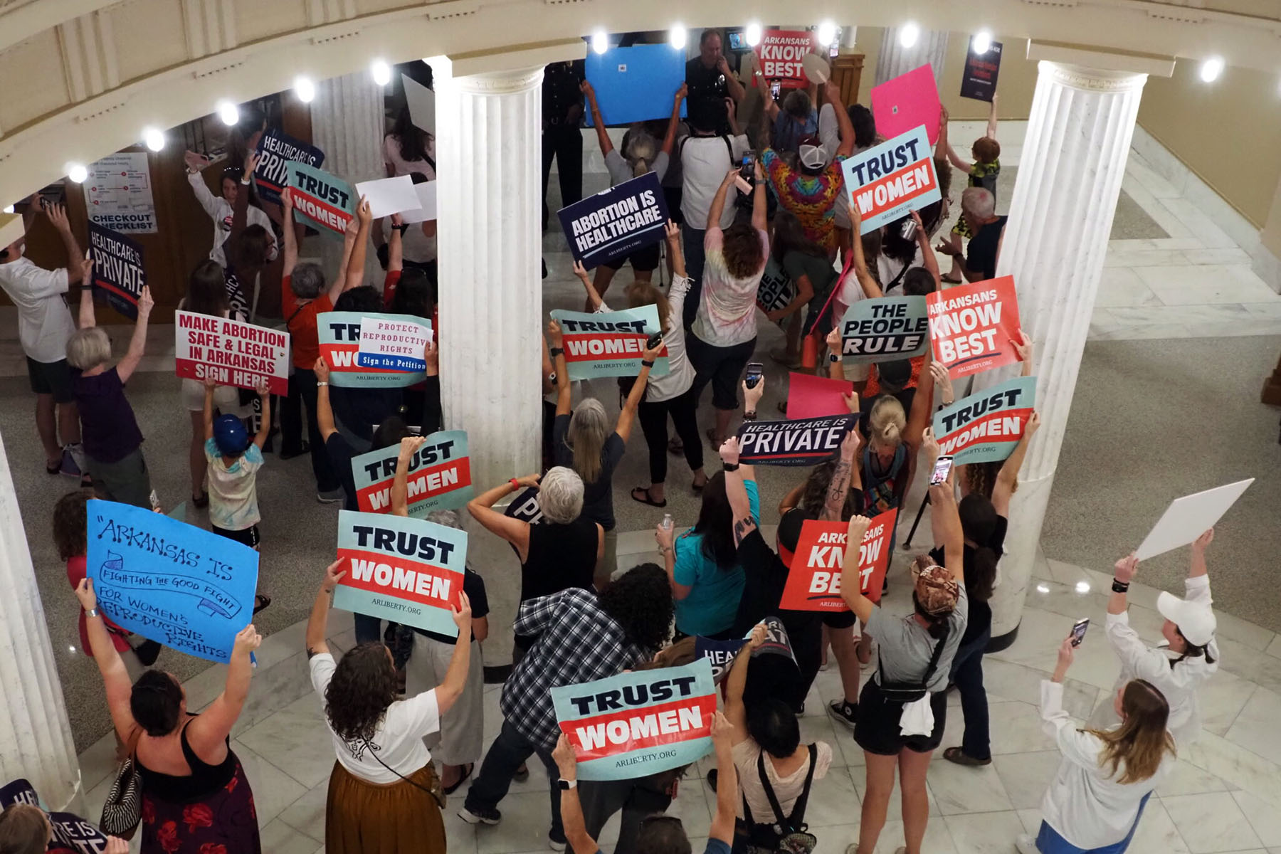 Supporters of the Arkansas Abortion Amendment cheer in the Arkansas State Capitol lobby.