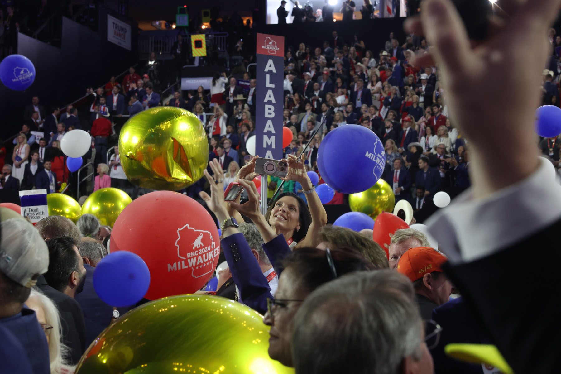 The crowd celebrates as balloons fall at the conclusion of former president Donald Trump's speech accepting the party's presidential nomination.