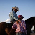 A woman rides a horse at the Bighorn Rodeo in Las Vegas.