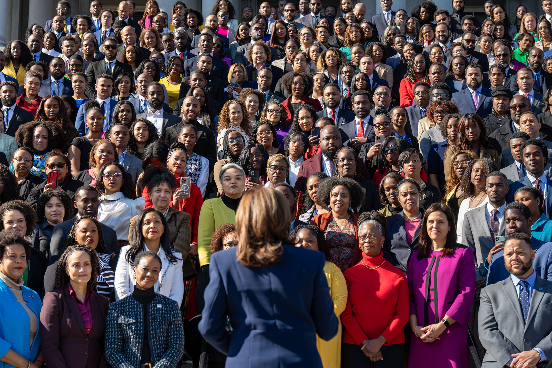 Vice President Kamala Harris poses for a photo with White House and Administration staff in honor of Black History Month.