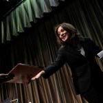 Kamala Harris exits the stage after speaking at the National Action Network's annual convention.