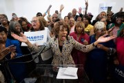 Rep. Maxine Waters is surrounded by supporters of Kamala Harris at a Los Angeles event.