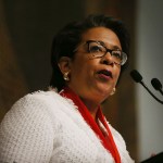 Loretta Lynch, the former attorney general, at a lectern after receiving an award in 2017