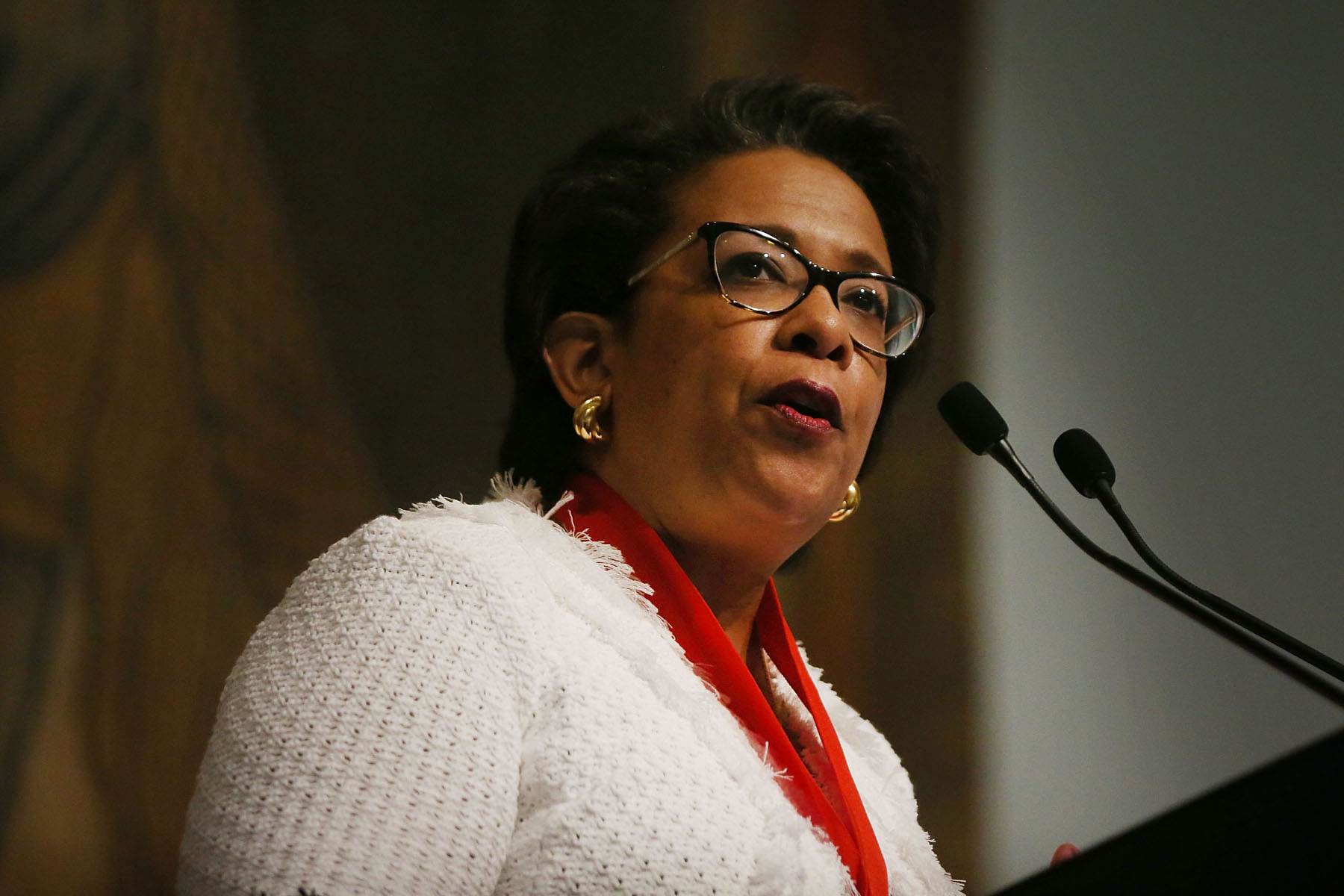 Loretta Lynch, the former attorney general, at a lectern after receiving an award in 2017