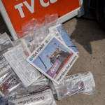 Newspapers lay on the ground in Milwaukee, Wisconsin. The front page of USA Today is seen with a photo of Trump being escorted off stage after an assassination attemp with the headline 