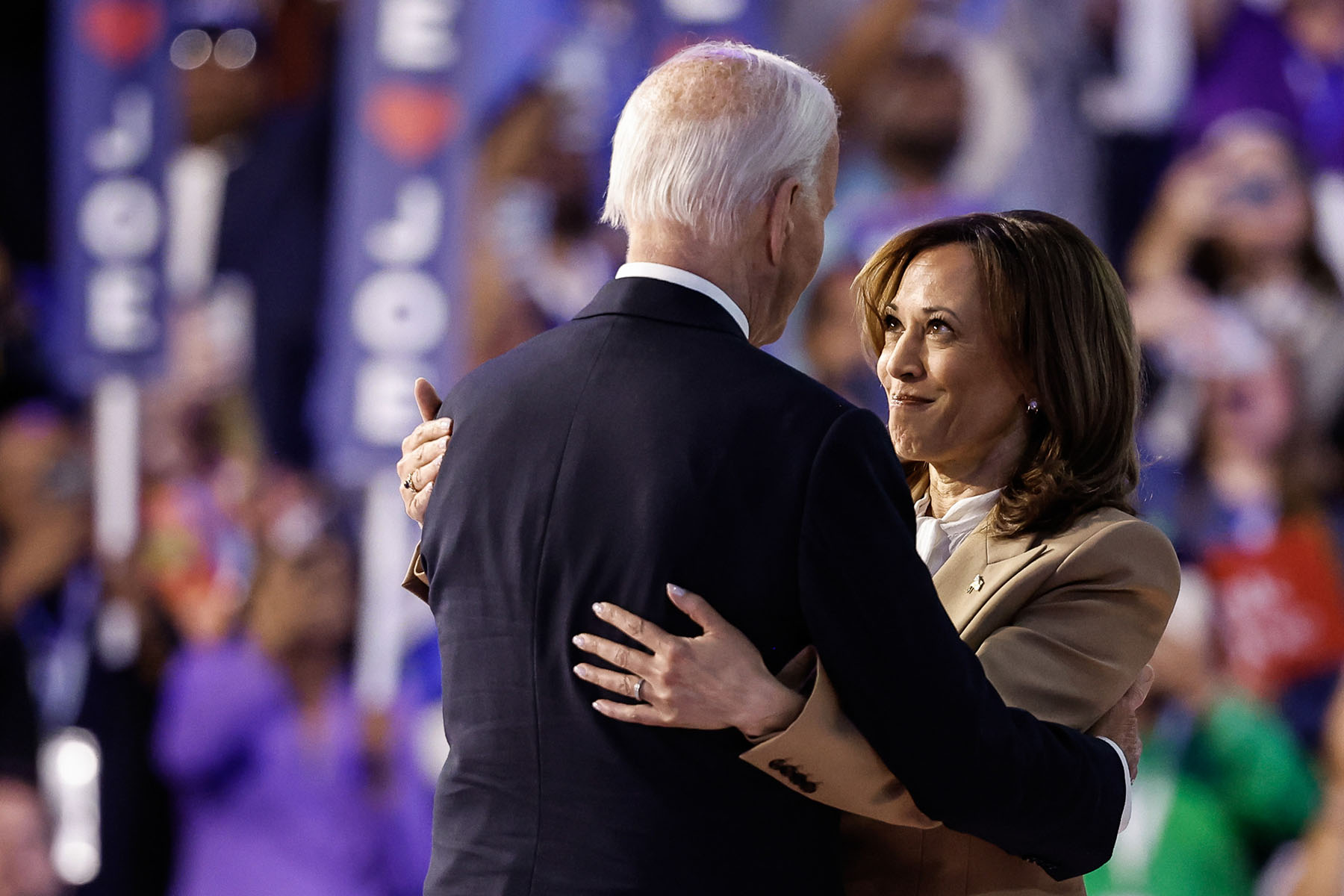 Vice President Kamala Harris greet President Joe Biden at the end of the first day of the DNC.