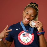 Ariana Ramsey poses with her Olympic medal.