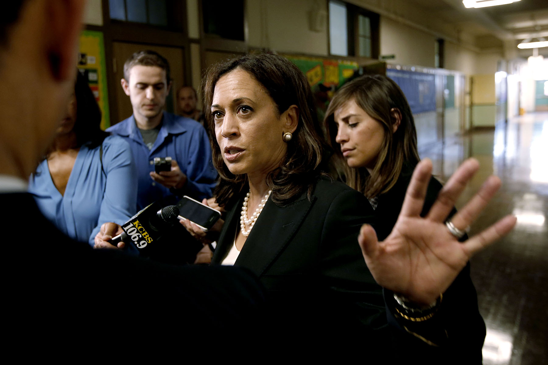 Kamala Harris speaks to the media at East Oakland Pride Elementary School.