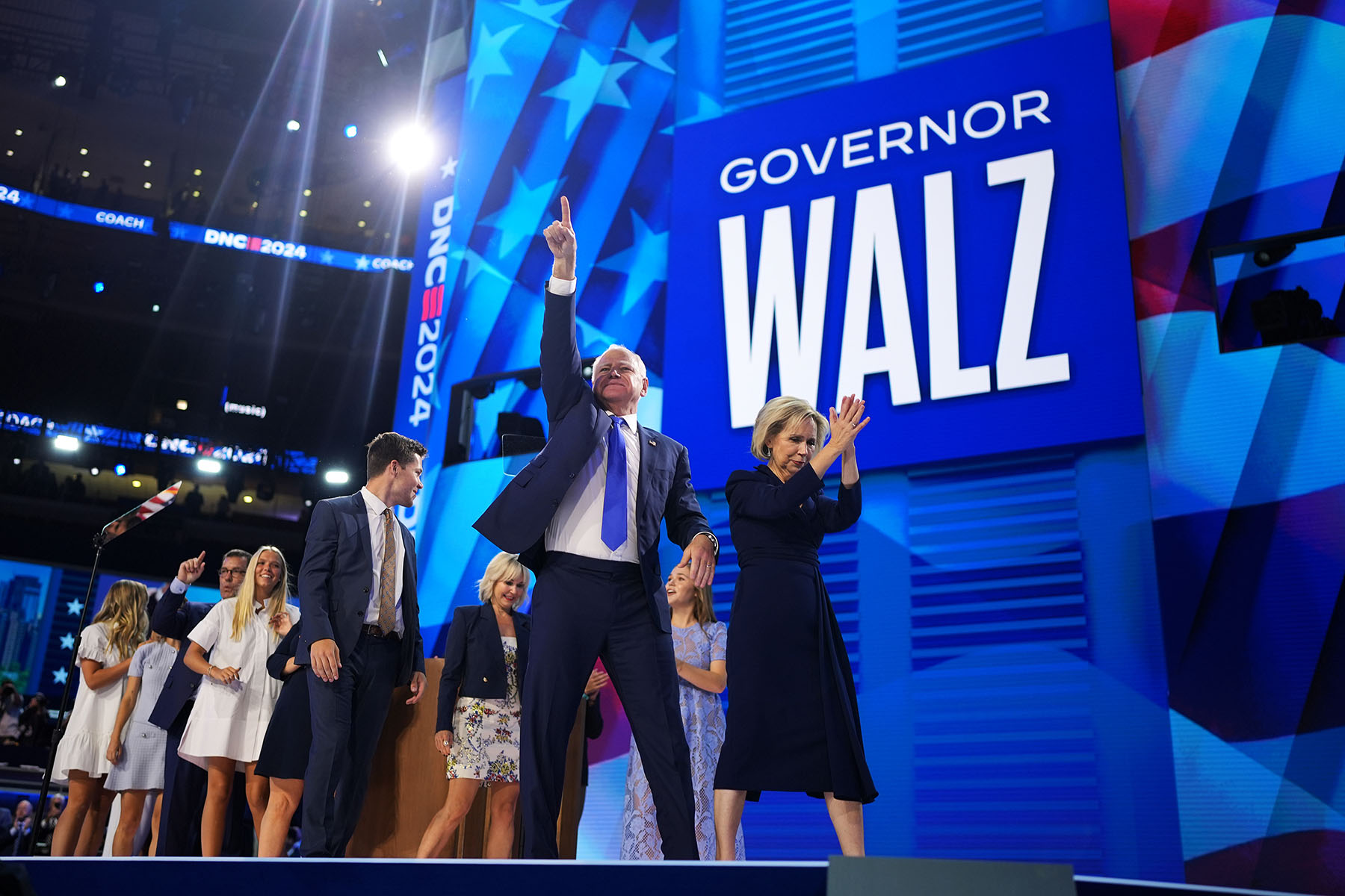 Minnesota Gov. Tim Walz celebrates with his family on stage at the DNC.