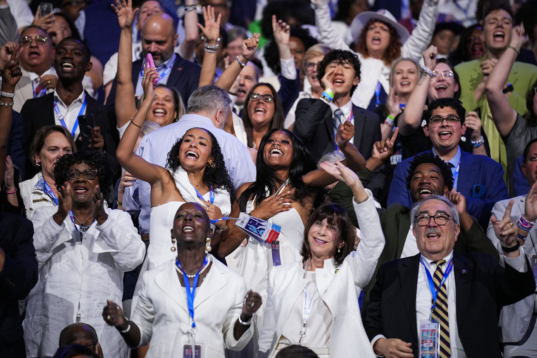 Attendees cheer during the final day of the Democratic National Convention at the United Center on August 22, 2024 in Chicago, Illinois.