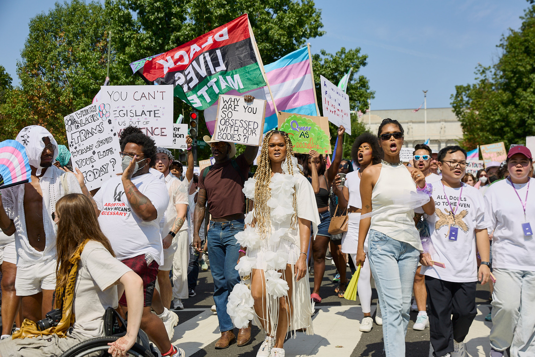 Participants walk in the inaugural Gender Liberation March in Washington, D.C., on Saturday, Sept. 14, 2024.