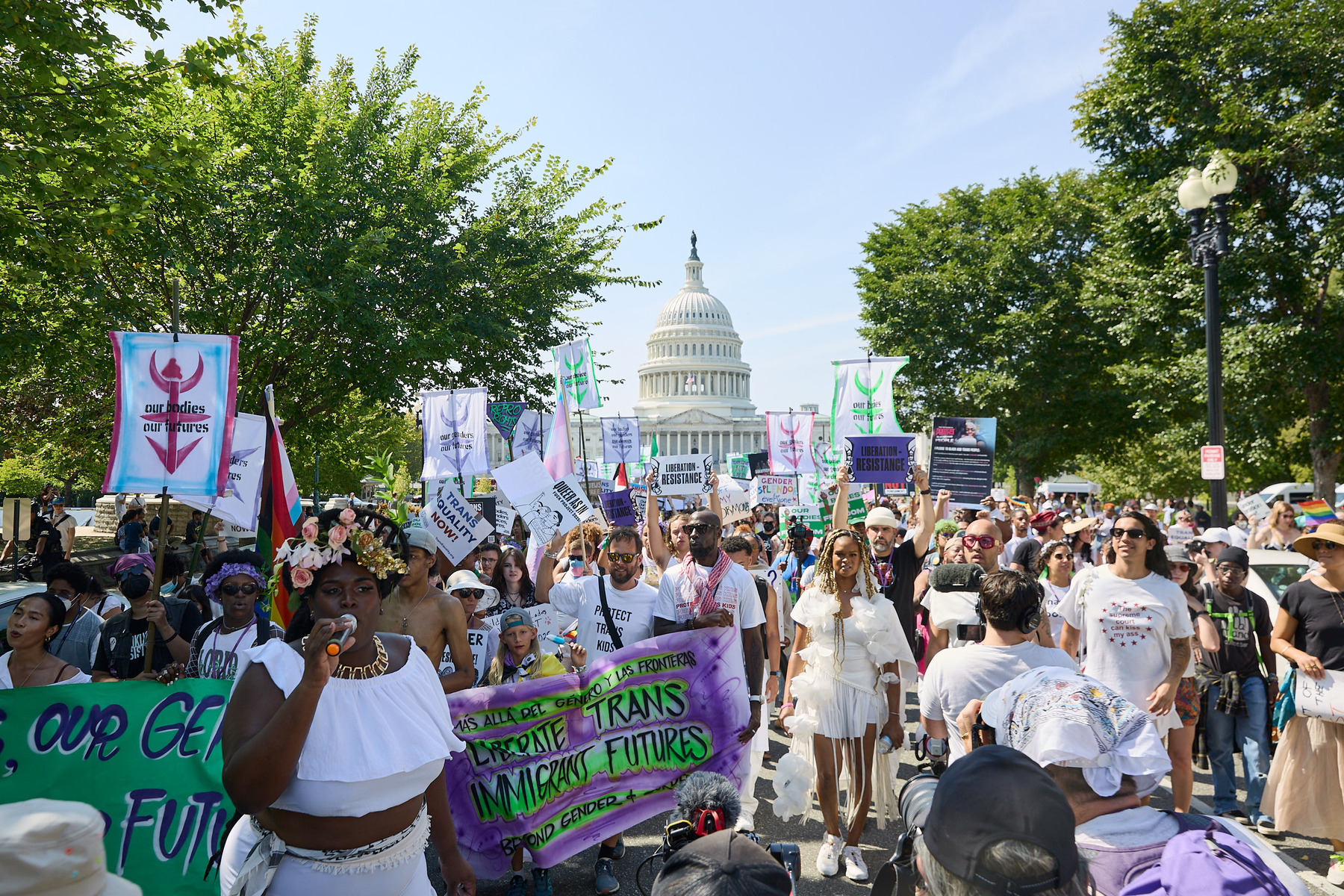 Thousands of LGBTQ+ people and their loved ones dance and chant through the inaugural Gender Liberation March in Washington, D.C.