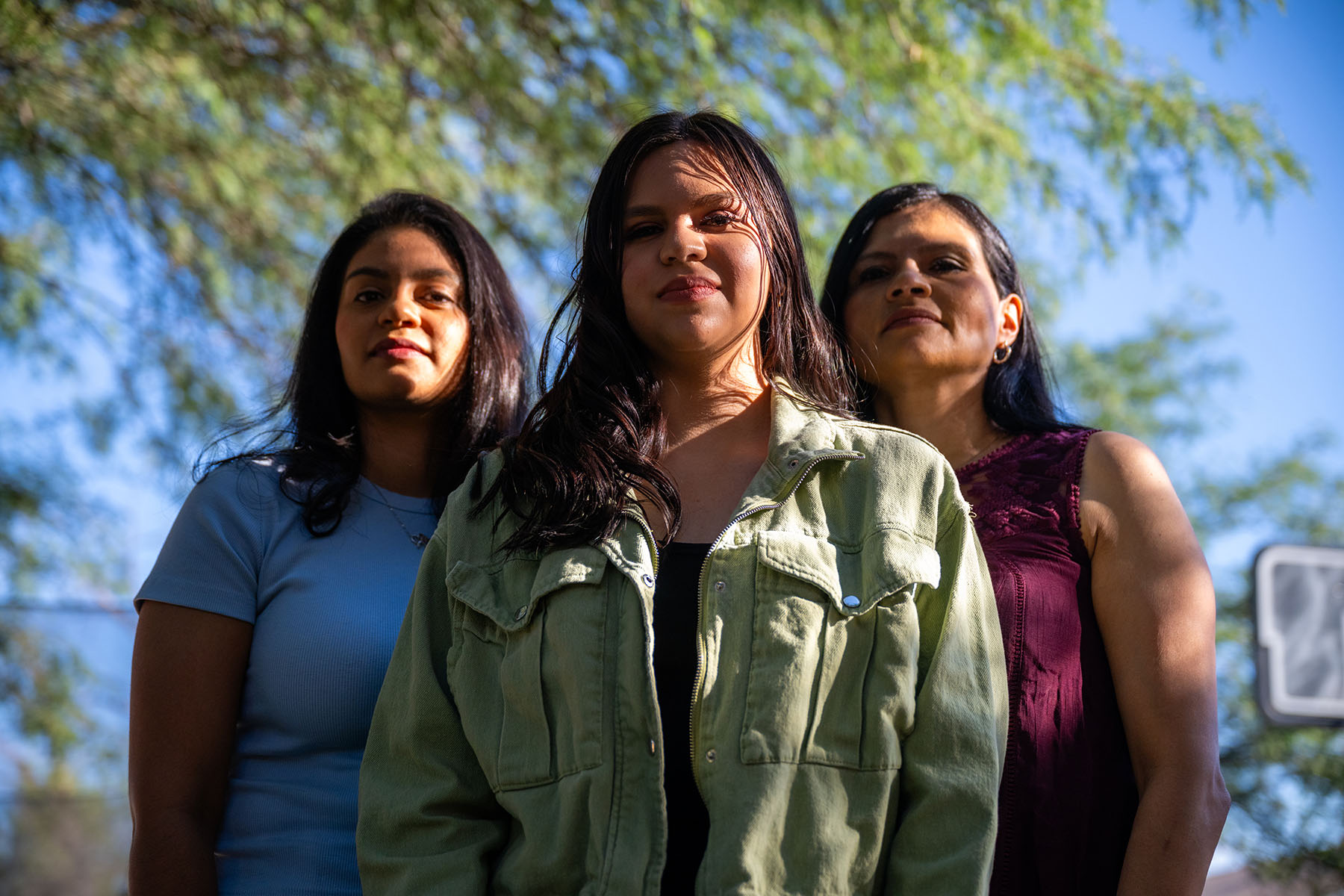 Adriana Grijalva poses for a portrait with her sister and mother at their home in Tucson, Arizona.