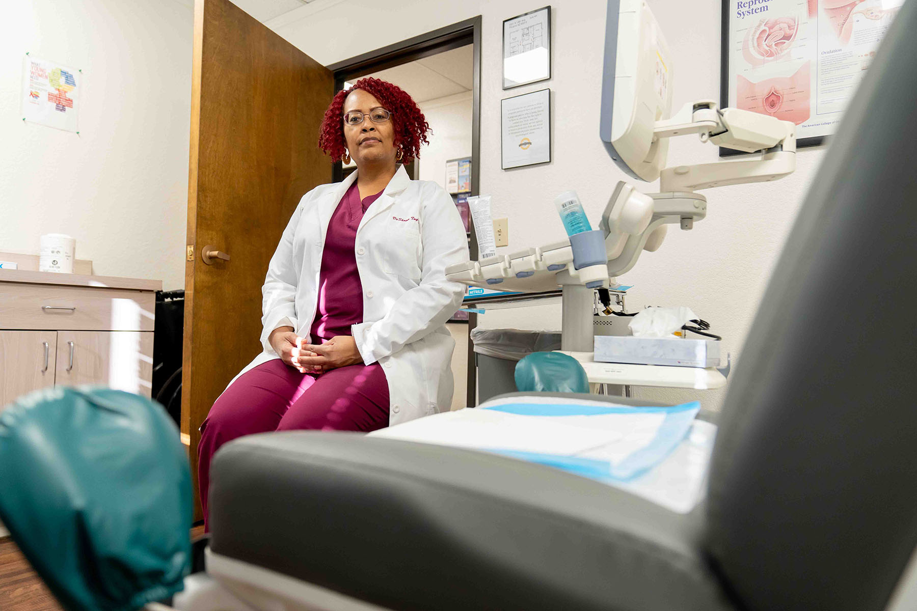 Dr. DeShawn Taylor poses for a portrait inside an ultrasound room at the Desert Star Institute for Family Planning in Phoenix.