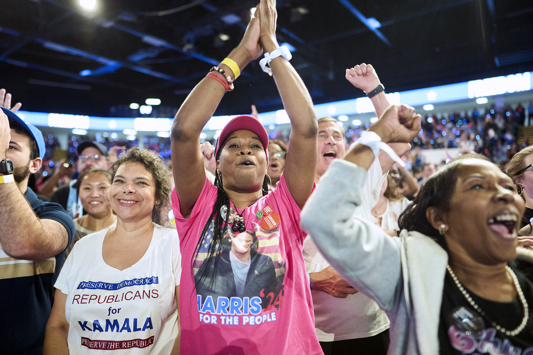 Supporters cheer as Vice President Kamala Harris speaks during a campaign event in Flint, Michigan.