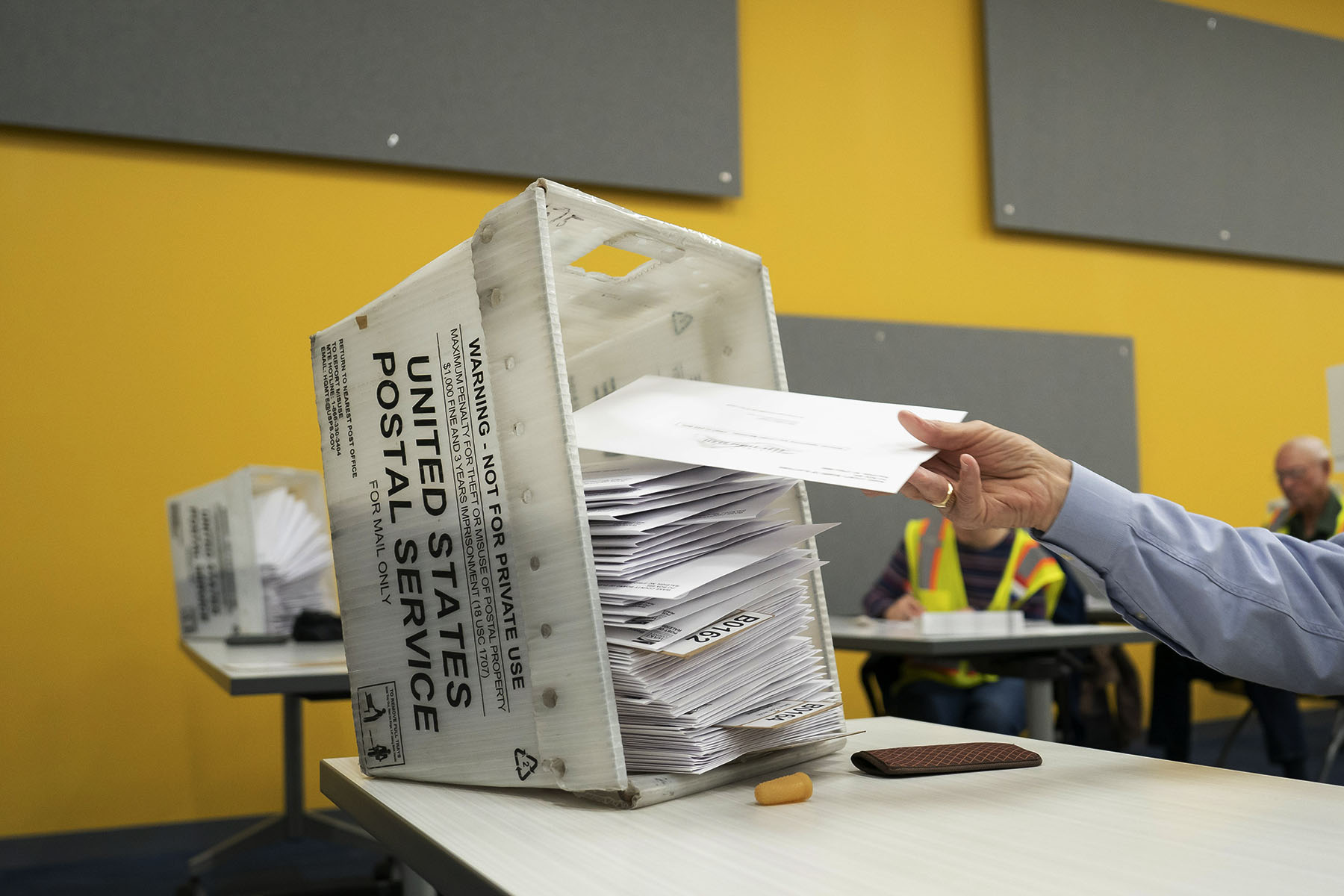 Absentee ballots are prepared to be mailed to military and overseas citizens at the Wake County Board of Elections in Raleigh, North Carolina.