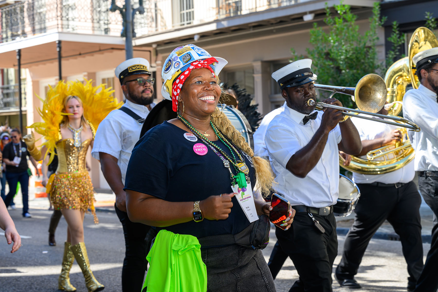 A tradeswoman wearing a Rosie the Riveter inspired bandana marches at the annual banner parade in New Orleans, Louisiana.