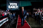 Former President Donald Trump walks out to speak during a campaign rally in Greensboro, North Carolina.