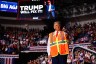 Former President Donald Trump points to supporters during a campaign event in Green Bay, Wisconsin.