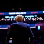 Former President Donald Trump, seen from the back, speaks at a campaign rally at Madison Square Garden.