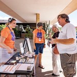 Activists discuss abortion access with voters at the entrance to the Murphy-Wilmot Library in Tucson, Arizona.