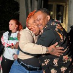 Breonna Taylor's mother, Tamika Palmer, hugs a friend in reaction to Brett Hankison's conviction in federal court.