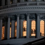 People are seen walking up stairs through windows at the top of the Capitol dome.