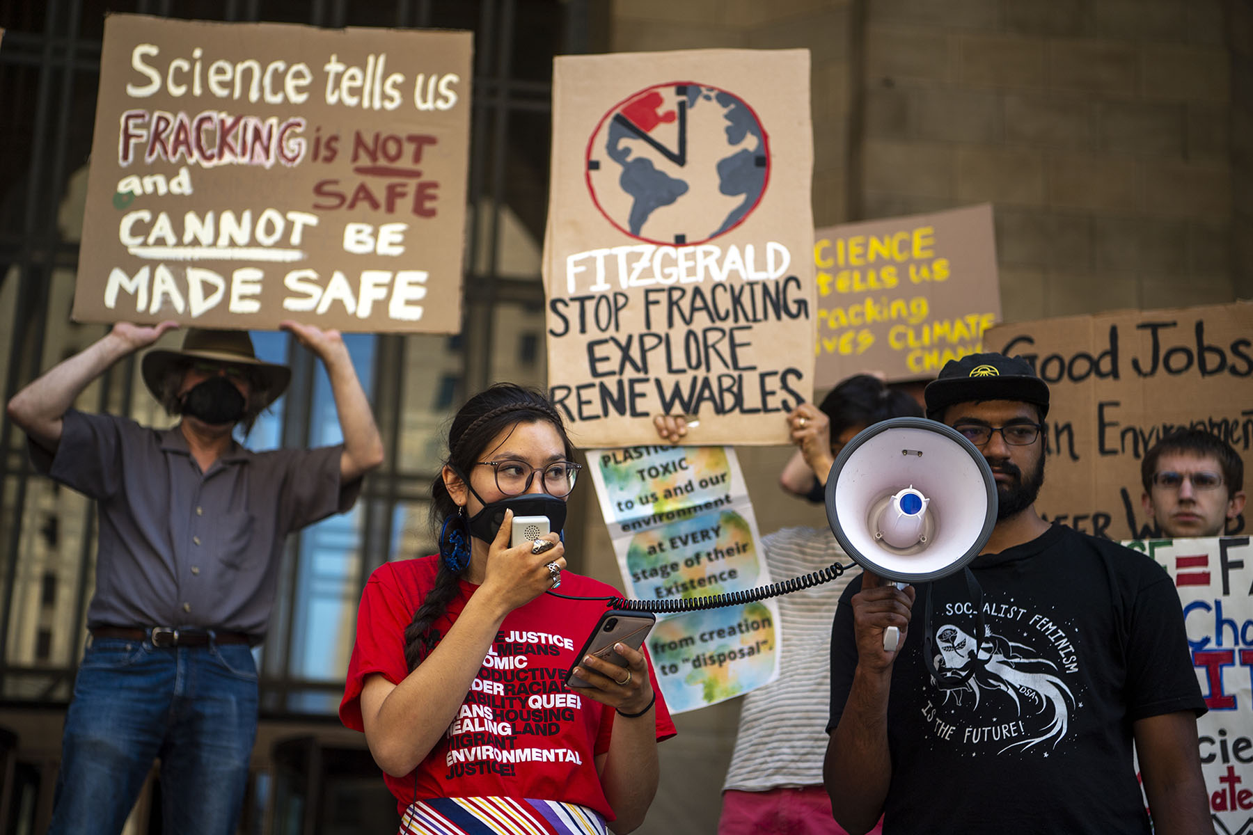 An activist speaks at an anti-fracking rally outside the City-County Building in downtown Pittsburgh.