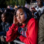 Student Brielle Jackson listens to polling results during an election night event for Vice President Kamala Harris at Howard University.