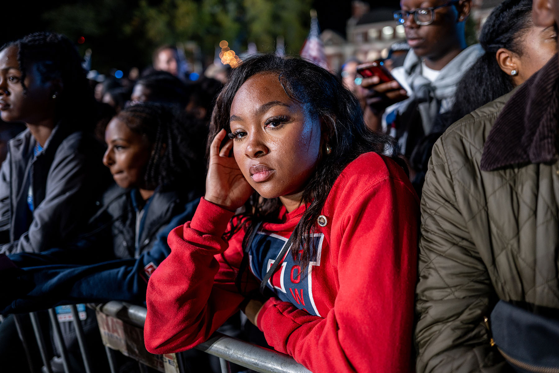 Student Brielle Jackson listens to polling results during an election night event for Vice President Kamala Harris at Howard University.