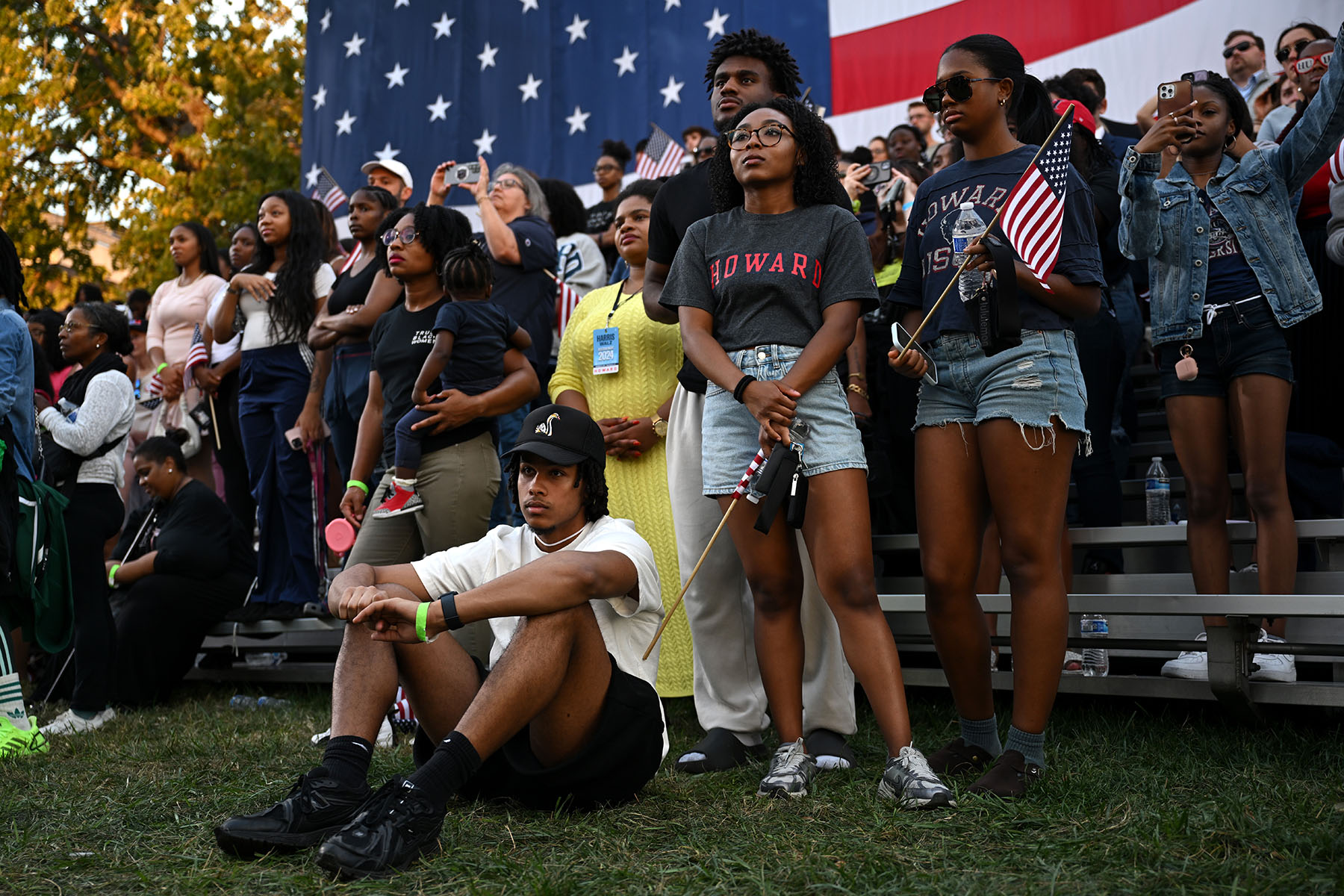 A crowd watches as Vice President Kamala Harris concedes the election during a speech at Howard University.