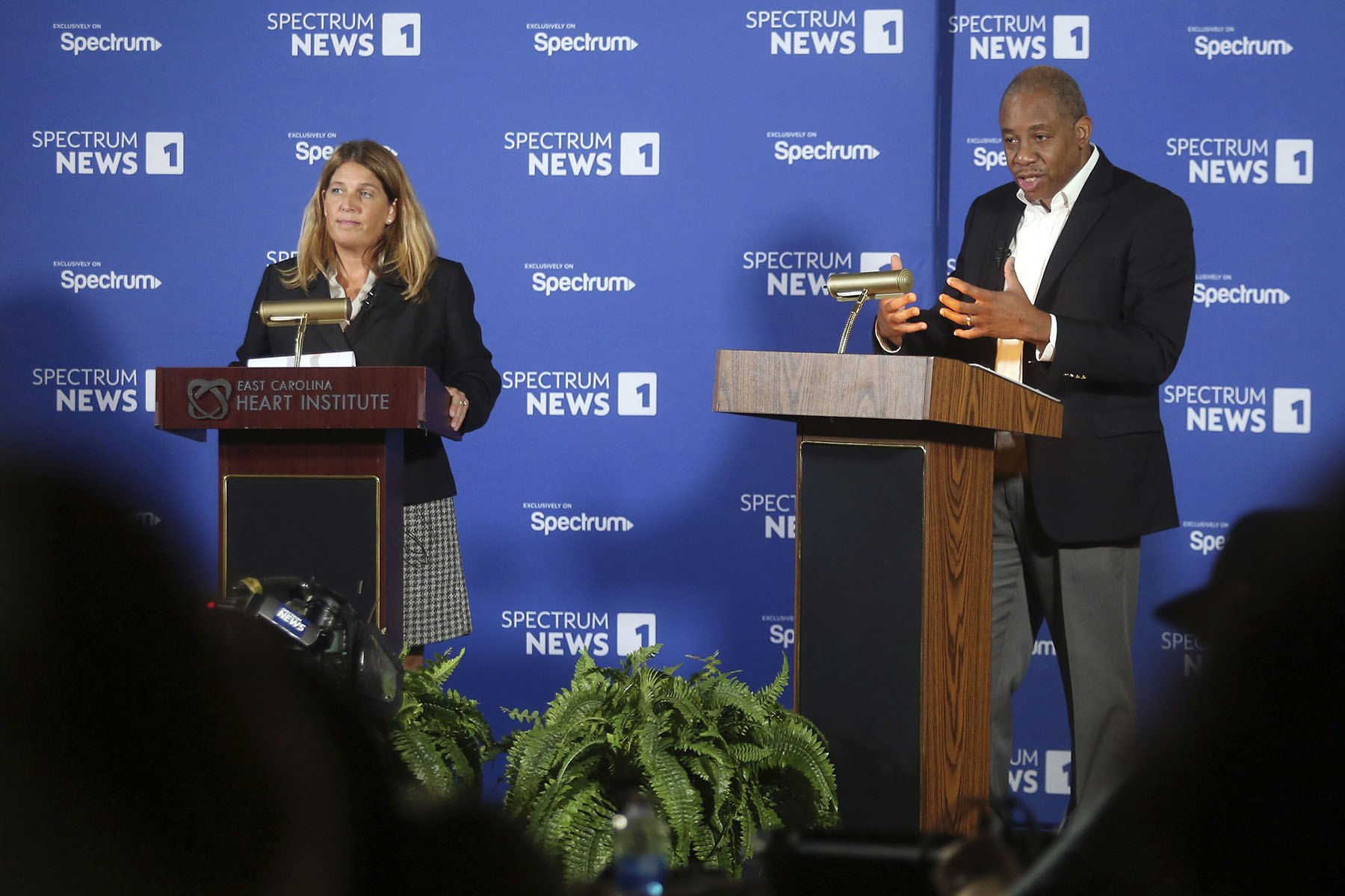 State Superintendent candidates Michele Morrow (left) and Mo Green participate debate at the Heart Institute at East Carolina University.