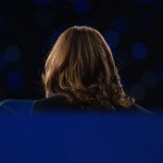 The back of Vice President Kamala Harris's head is seen as she makes remarks at a campaign rally in Greensboro, North Carolina.