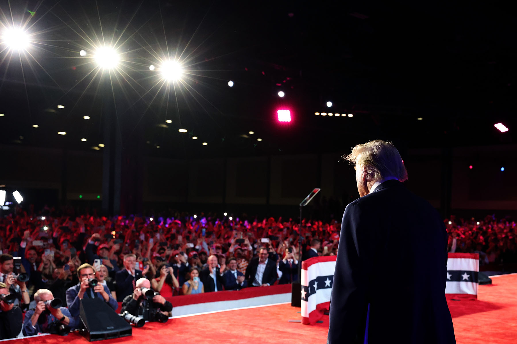 Former President Donald Trump arrives to speak during an election night event at the Palm Beach Convention Center.