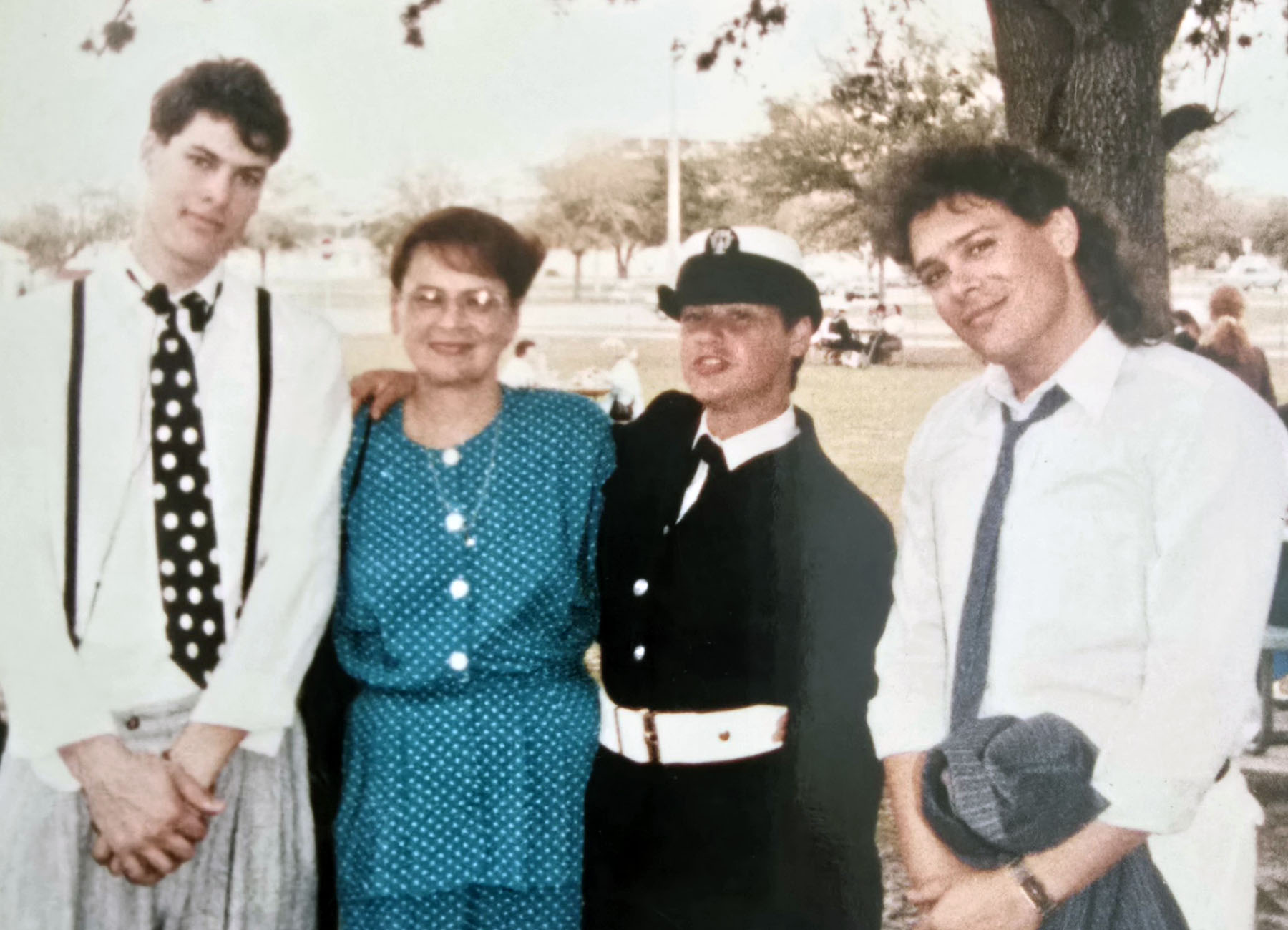 The Rodriguez family celebrates Elaine's boot camp graduation in Orlando. From left to right, her younger brother, Philip, their mother, Maria, and her older brother, Paul.