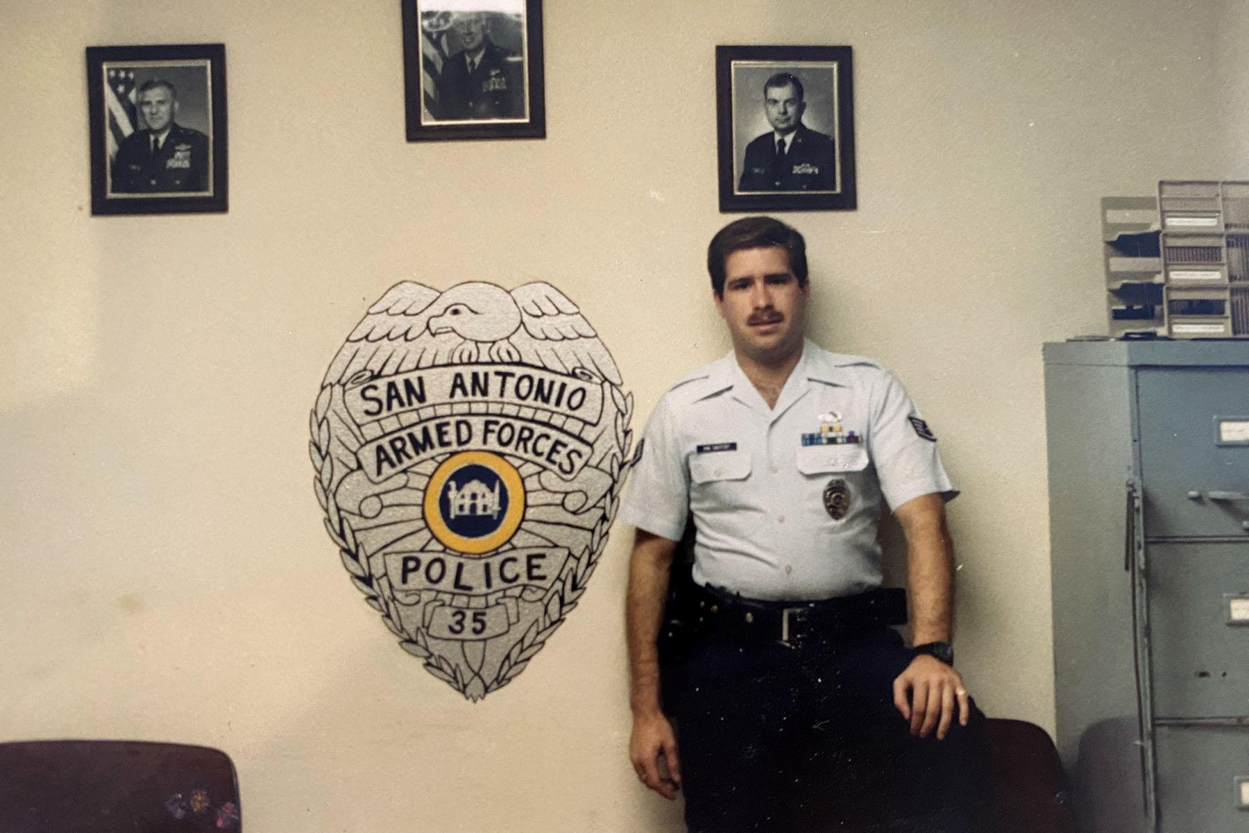 Todd VanCantfort poses at a police station. He was a member of the San Antonio Armed Forces Police Department in the mid-80s.