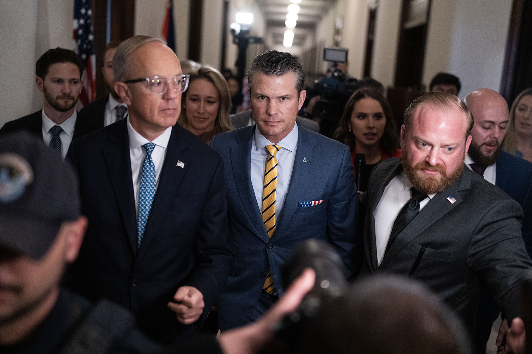 Pete Hegseth, President-elect Donald Trump's nominee to be defense secretary, makes his way to a meeting on Capitol Hill.