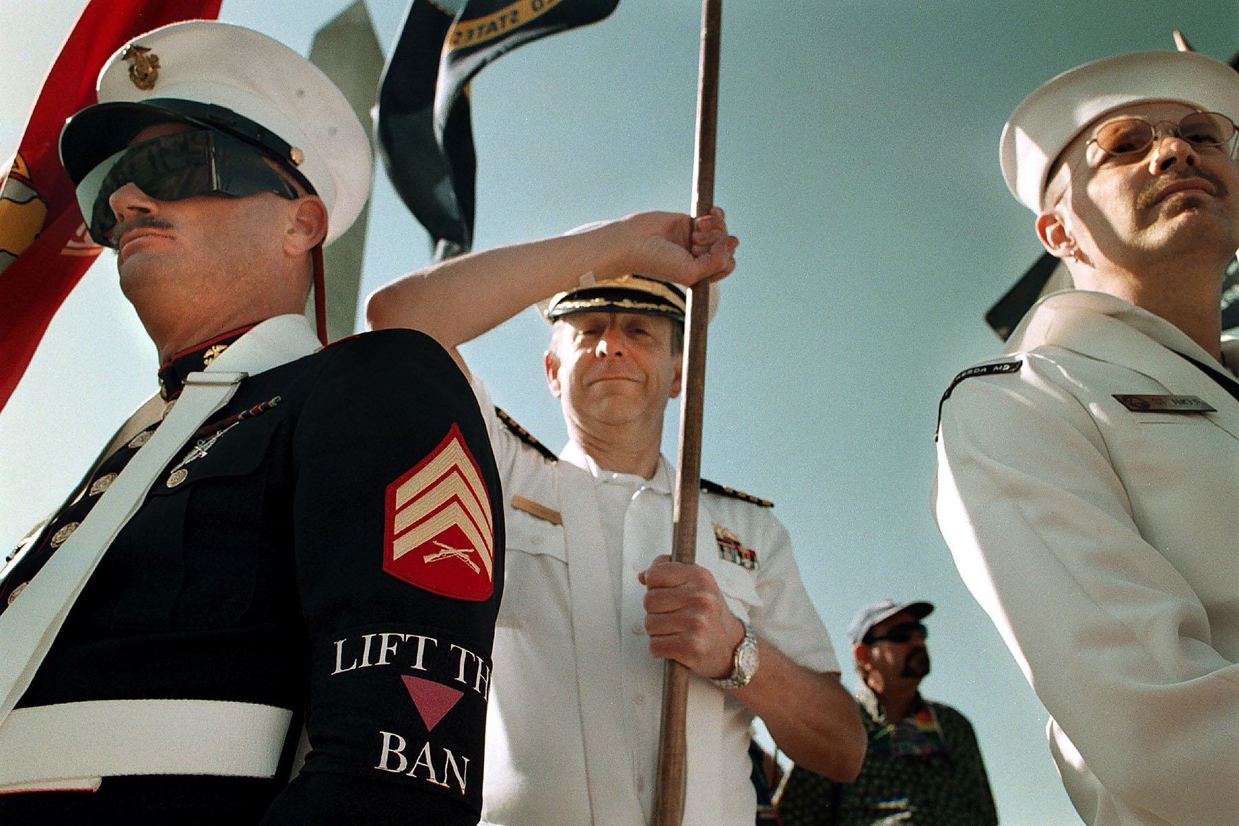 A retired Sargent wears a "lift the ban" armband to protest the "don't ask, don't tell" policy against gays in the military