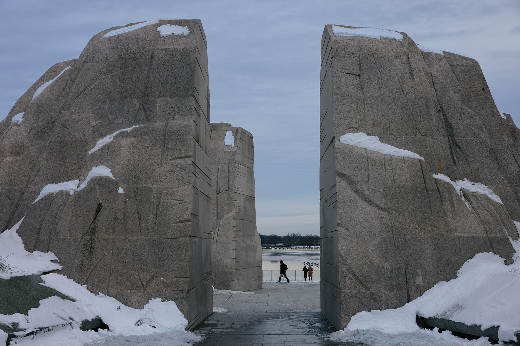 People visit the Martin Luther King, Jr. Memorial along the National Mall's Tidal Basin.