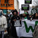 Demonstrators march during the People's March on January 18, 2025, in Washington, D.C.
